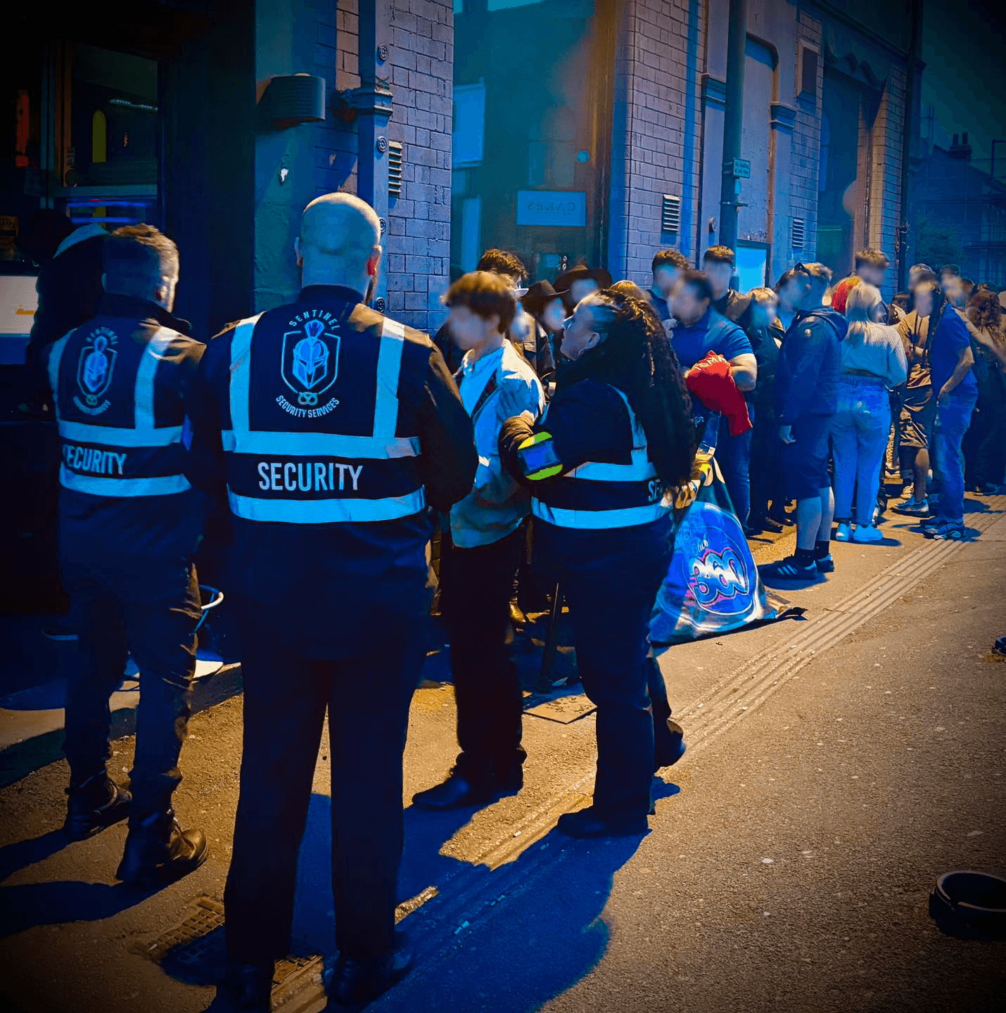 Sentinel officers on duty at a busy night-time event